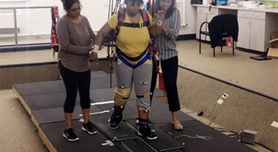 woman walks on research machine